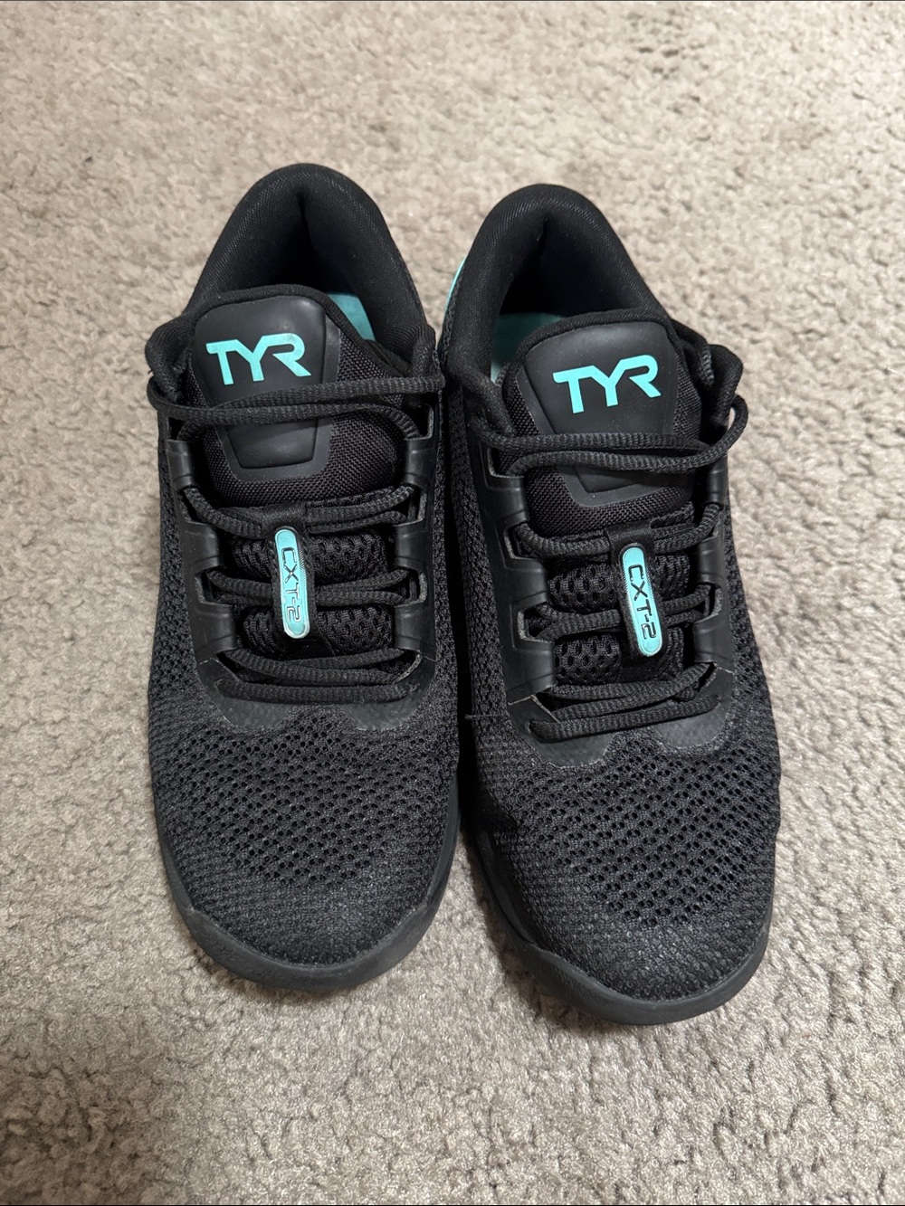 TYR CXT-2 like new, barely worn black with teal. Women’s 8.5 men’s 7.